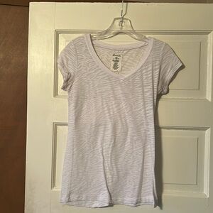 Bozzolo white animal print short sleeve top, size Large good condition